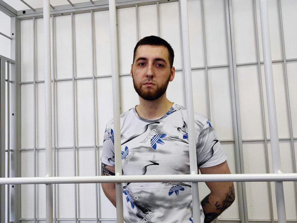 Portrait de Nikita Oleinik, opposant russe emprisonné, victime de la répression en Russie