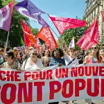 Banderole du Nouveau Front Populaire lors de la manifestation féministe contre l’extrême-droite à Paris
