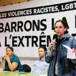 Banderole contre l'extrême droite lors d'une conférence de solidaritéS