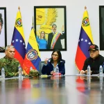 Delcy Rodriguez devant les portraits de Simon Bolivar, Hugo Chavez et Nicolas Maduro