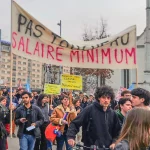 Banderole «Pas touche au salaire minimum»